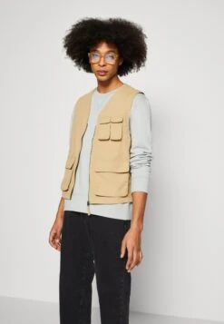 Pier One Chaleco - Tan 9 Pier One Chaleco - Tan -Tienda De Moda Boutique f195baee9fb6489dbaeb853180d004d6